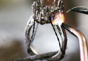 Soldering a white gold ring.